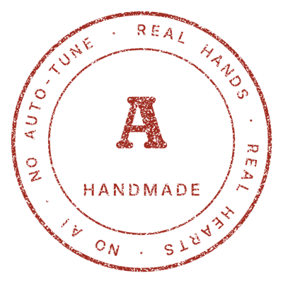 Handmade mark in red wax: Real hands, real hearts. No AI, no Auto-Tune.